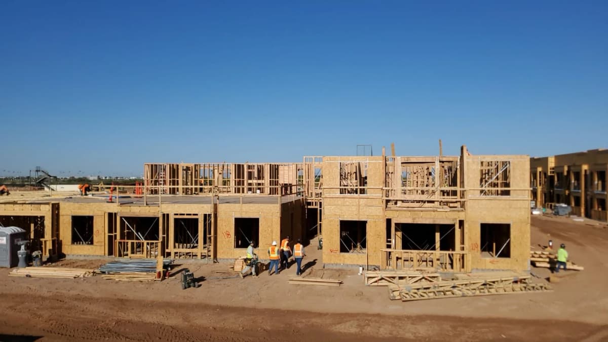 Team breaking ground at construction site